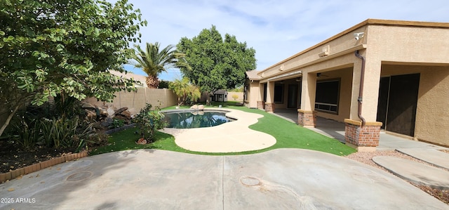 view of pool with a patio area, a fenced backyard, and a fenced in pool