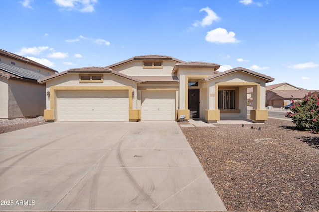 30215 N Joshua Tree Dr, Florence, AZ 85132 - view of front of home featuring stucco siding, driveway, a tile roof, and a garage