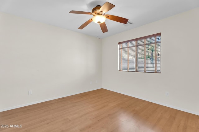 30215 N Joshua Tree Dr, Florence, AZ 85132 - empty room with wood finished floors and ceiling fan