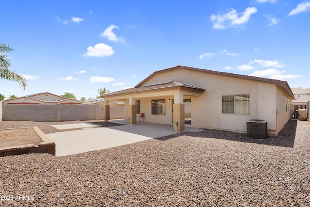 30215 N Joshua Tree Dr, Florence, AZ 85132 - back of property featuring a patio, a fenced backyard, and stucco siding