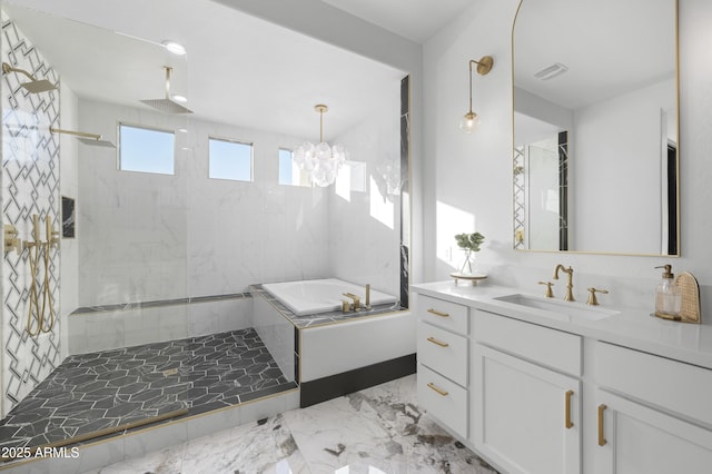 full bath featuring visible vents, a walk in shower, a bath, marble finish floor, and vanity