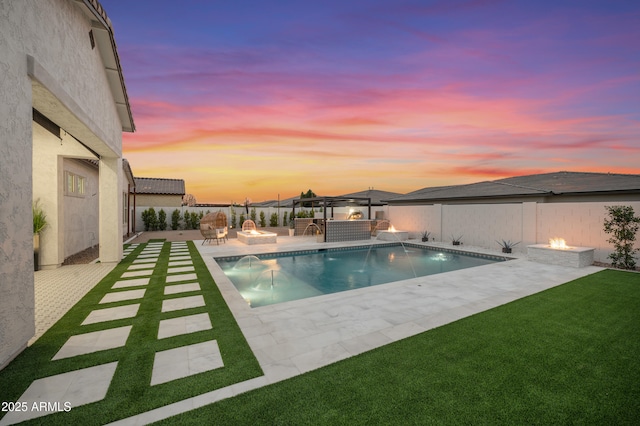 pool at dusk with a fenced in pool, an outdoor fire pit, a yard, a fenced backyard, and a patio