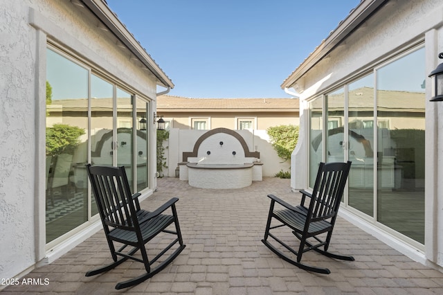 view of patio / terrace with fence