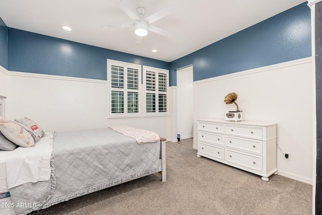 bedroom with recessed lighting, light colored carpet, and ceiling fan