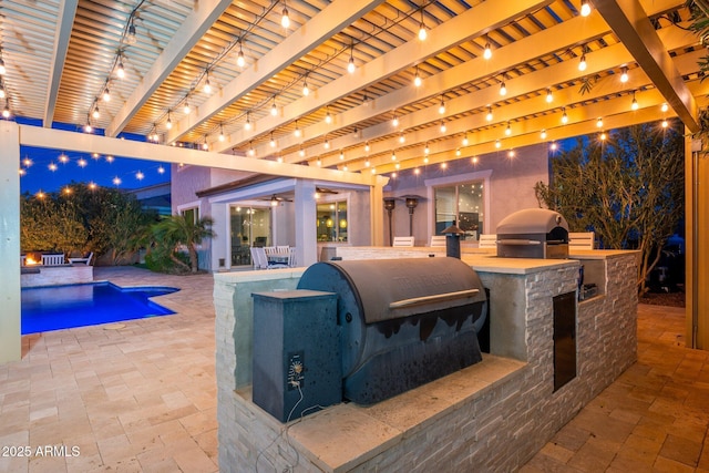 view of patio featuring a pergola, area for grilling, an outdoor pool, and grilling area