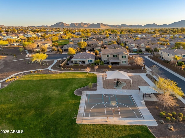 drone / aerial view featuring a mountain view and a residential view