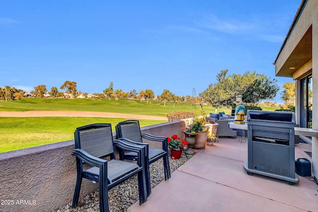 view of patio / terrace featuring grilling area and golf course view