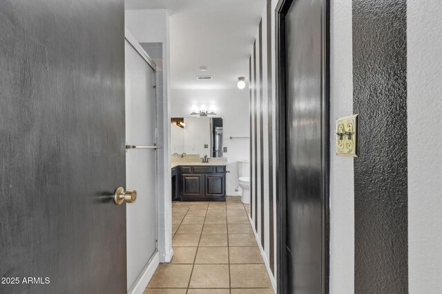 15210 S Country Club Way, Arizona City, AZ 85123 - interior space featuring light tile patterned floors and a sink