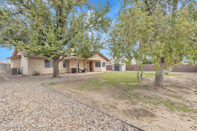 15210 S Country Club Way, Arizona City, AZ 85123 - rear view of house with a patio, an outbuilding, a shed, a fenced backyard, and stucco siding