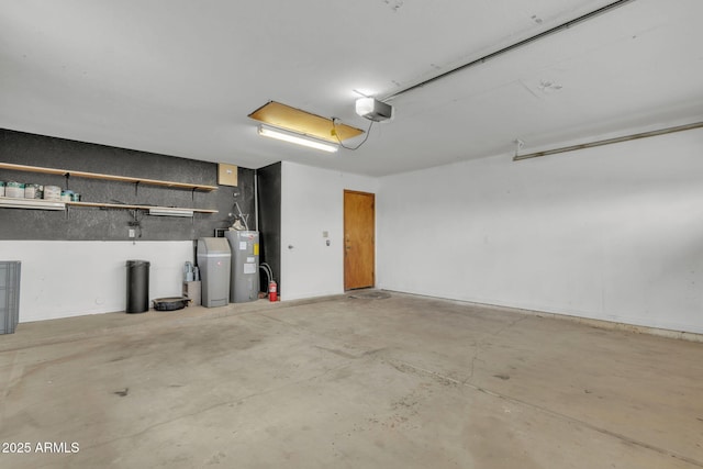 15210 S Country Club Way, Arizona City, AZ 85123 - garage with a garage door opener and water heater