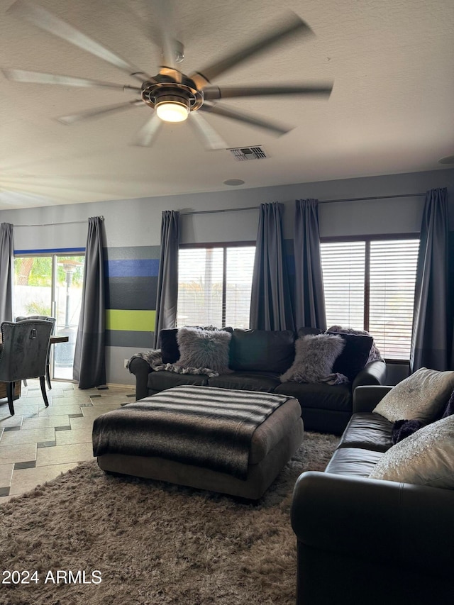 living room with ceiling fan