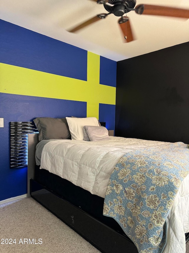 bedroom featuring carpet and ceiling fan