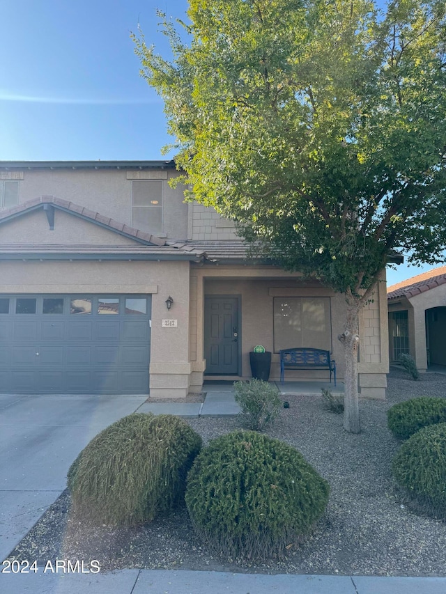 view of front of home with a garage