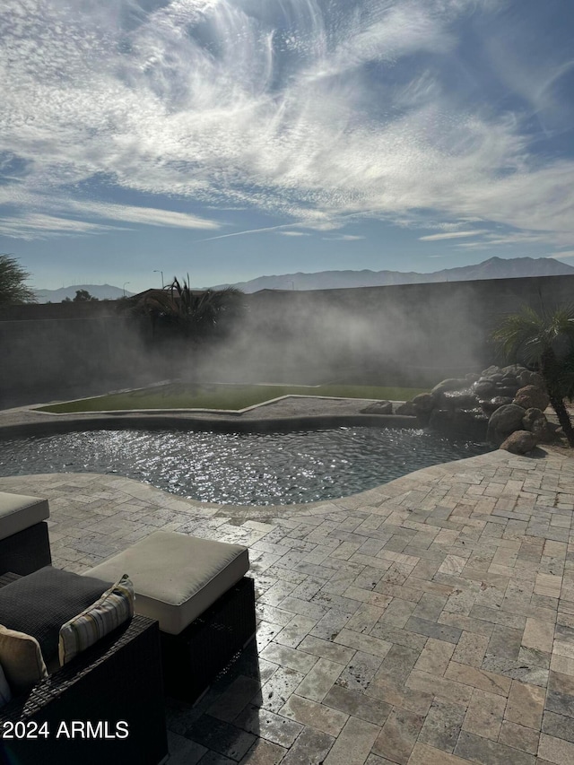 view of patio with a mountain view