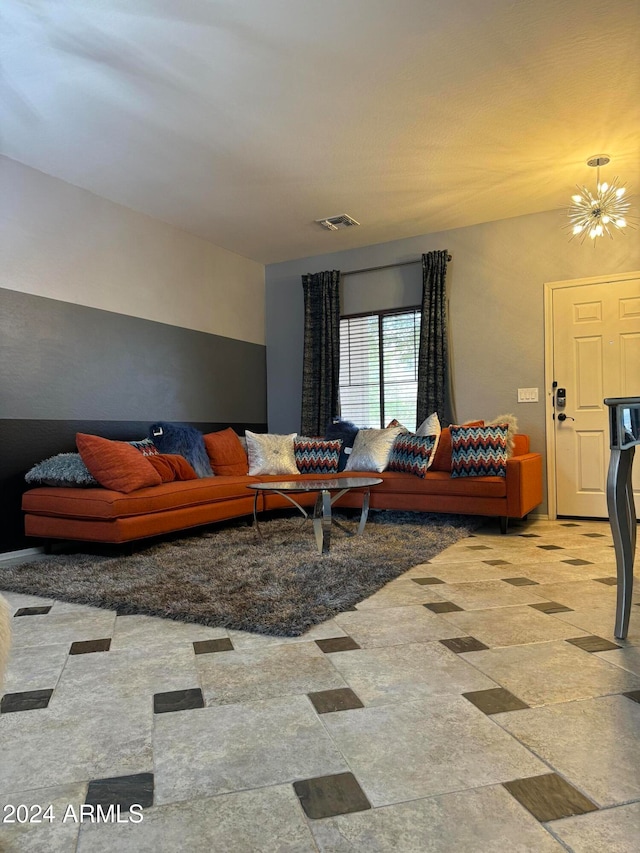 living room with an inviting chandelier