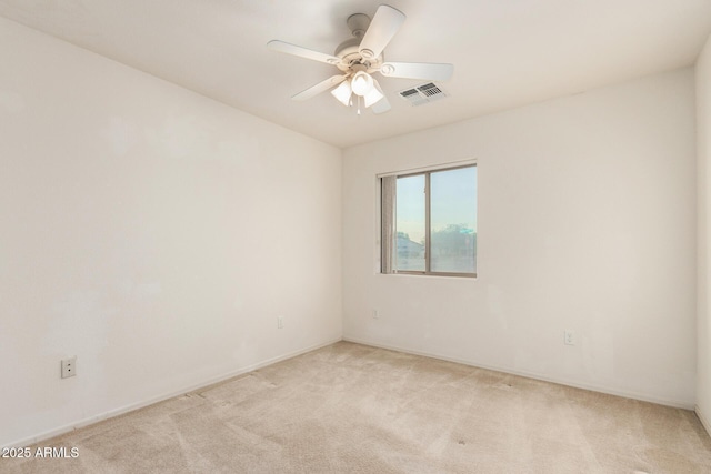 8271 W Cypress Point Cir, Arizona City, AZ 85123 - spare room with light carpet and ceiling fan