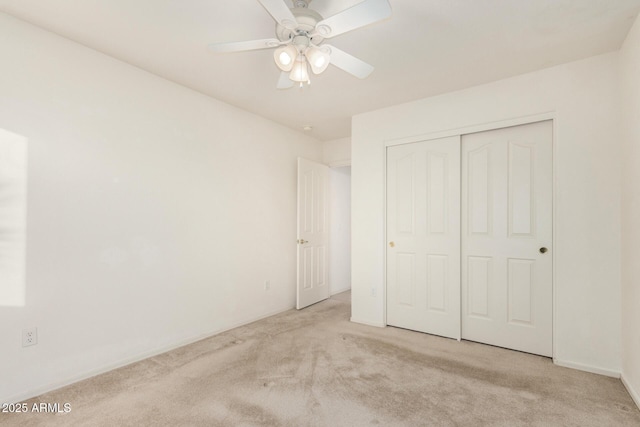8271 W Cypress Point Cir, Arizona City, AZ 85123 - unfurnished bedroom with carpet, a closet, and ceiling fan