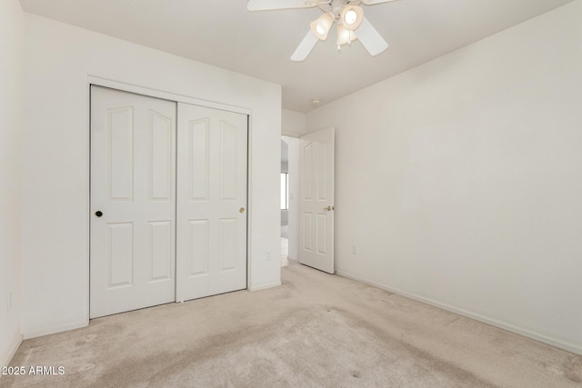 8271 W Cypress Point Cir, Arizona City, AZ 85123 - unfurnished bedroom featuring carpet, a closet, and ceiling fan