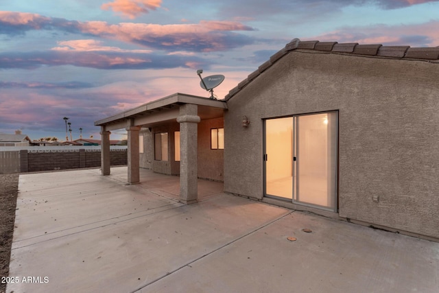 8271 W Cypress Point Cir, Arizona City, AZ 85123 - back of property with stucco siding and a patio area