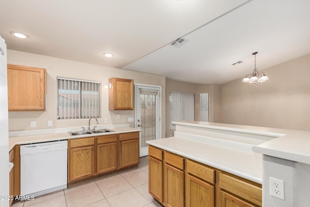 8271 W Cypress Point Cir, Arizona City, AZ 85123 - kitchen with white dishwasher, light tile patterned floors, light countertops, decorative light fixtures, and recessed lighting