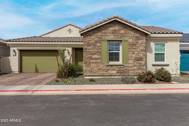 3842 E Bartlett Way, Chandler, AZ 85249 - view of front of property featuring stone siding, a tiled roof, and an attached garage