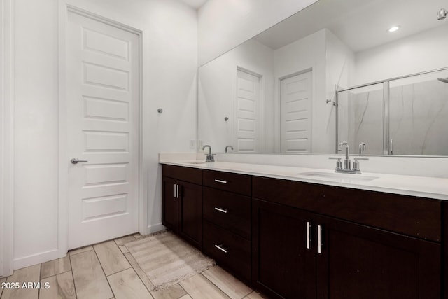 3842 E Bartlett Way, Chandler, AZ 85249 - bathroom featuring double vanity and a marble finish shower