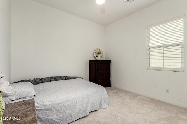 3842 E Bartlett Way, Chandler, AZ 85249 - bedroom with multiple windows, light carpet, baseboards, and ceiling fan
