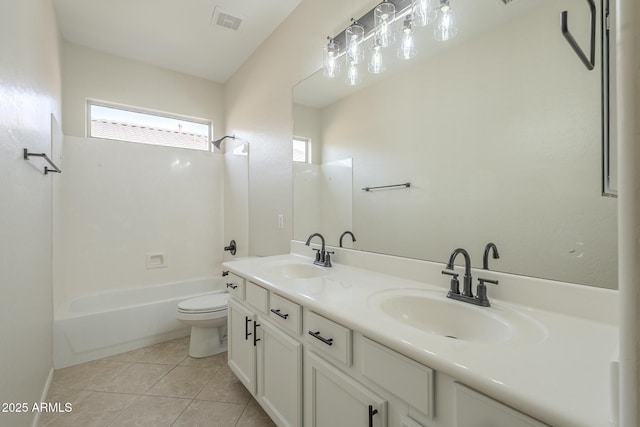 full bathroom featuring shower / washtub combination, tile patterned flooring, a healthy amount of sunlight, and toilet