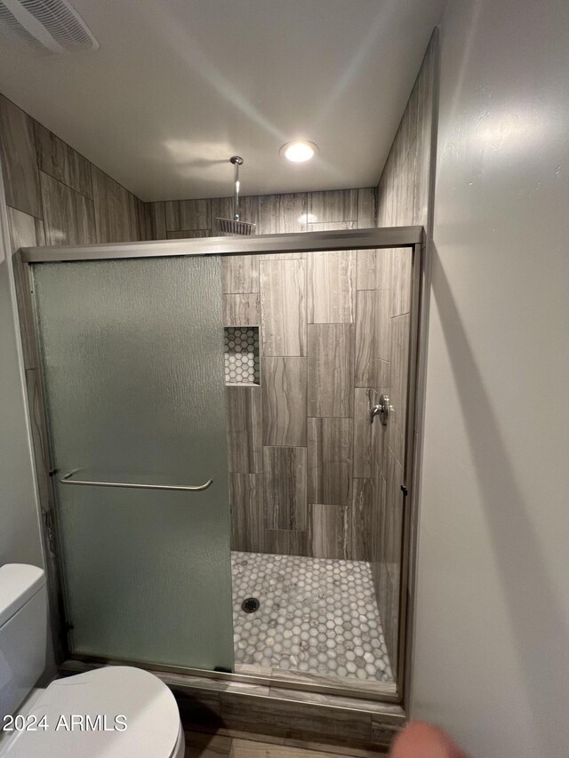 hallway with light hardwood / wood-style flooring