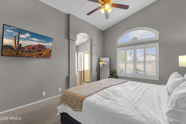 20239 N 39th Dr, Glendale, AZ 85308 - carpeted bedroom with arched walkways, baseboards, high vaulted ceiling, and ceiling fan