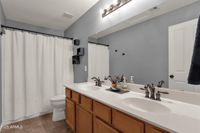20239 N 39th Dr, Glendale, AZ 85308 - full bath with toilet, double vanity, tile patterned flooring, and a shower with shower curtain