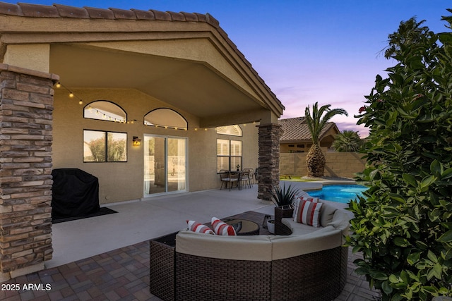 20239 N 39th Dr, Glendale, AZ 85308 - patio terrace at dusk featuring a patio area and an outdoor hangout area