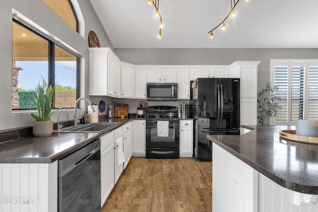20239 N 39th Dr, Glendale, AZ 85308 - kitchen featuring black appliances, a sink, and dark countertops