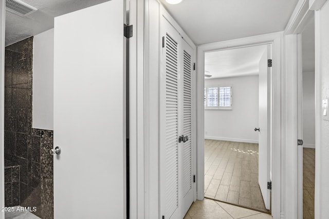 hallway featuring light hardwood / wood-style flooring