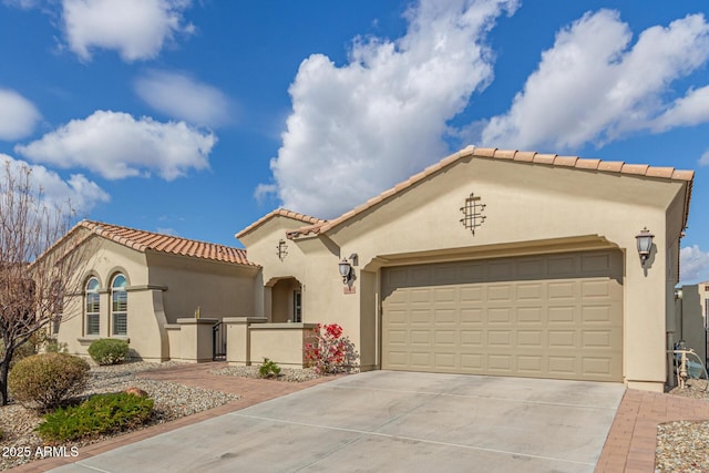 mediterranean / spanish-style home featuring a garage