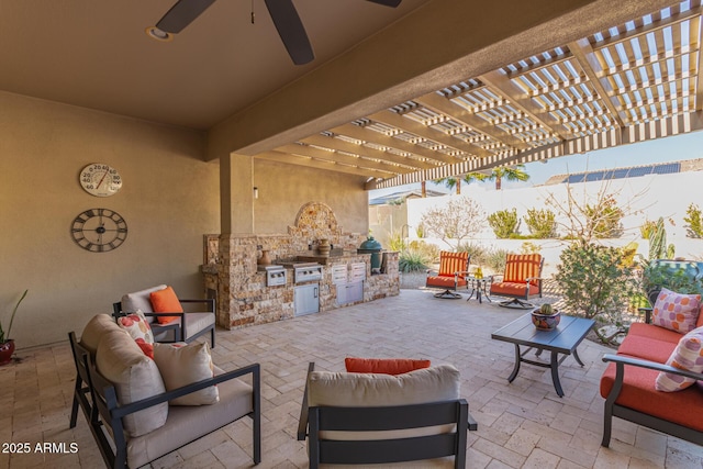 view of patio / terrace with exterior kitchen, an outdoor living space, and a pergola