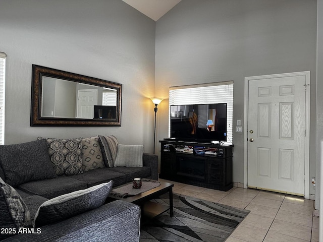 6538 W Nez Perce St, Phoenix, AZ 85043 - living room featuring high vaulted ceiling and light tile patterned floors