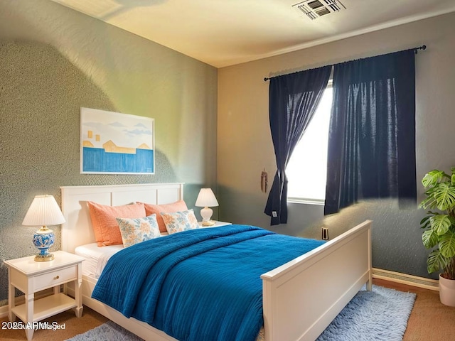 6538 W Nez Perce St, Phoenix, AZ 85043 - carpeted bedroom with baseboards