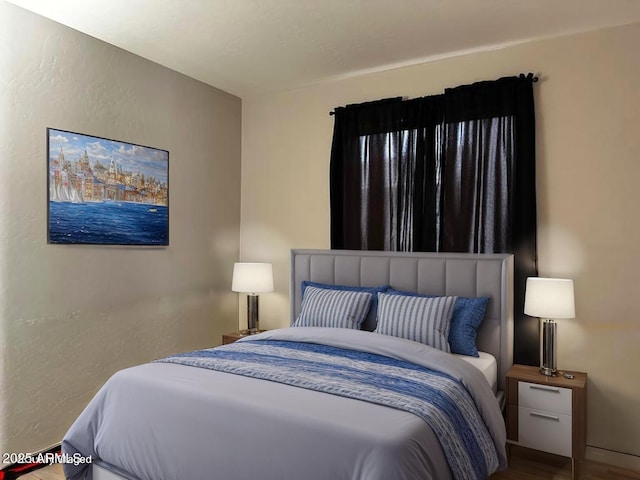 6538 W Nez Perce St, Phoenix, AZ 85043 - bedroom featuring wood finished floors