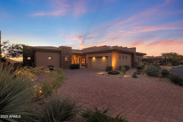 view of front of property featuring a garage