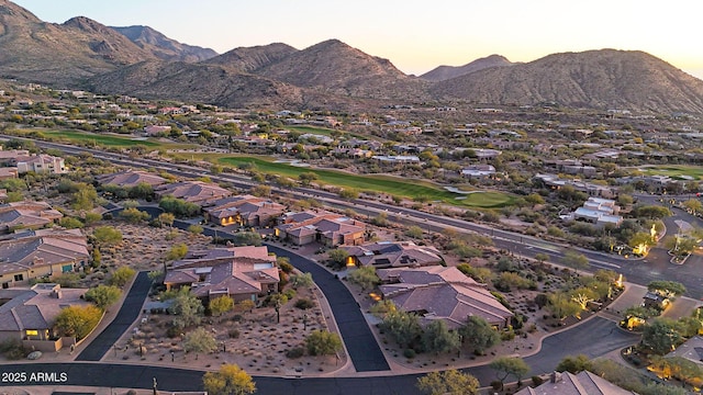 aerial view at dusk with a mountain view