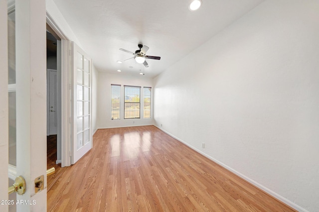 10253 E Indigo Dr, Scottsdale, AZ 85255 - unfurnished room featuring light wood-style flooring, a ceiling fan, baseboards, and recessed lighting