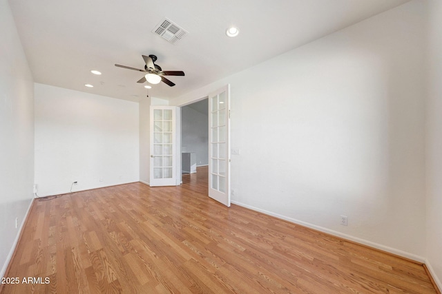 10253 E Indigo Dr, Scottsdale, AZ 85255 - empty room featuring french doors, ceiling fan, light wood finished floors, baseboards, and recessed lighting