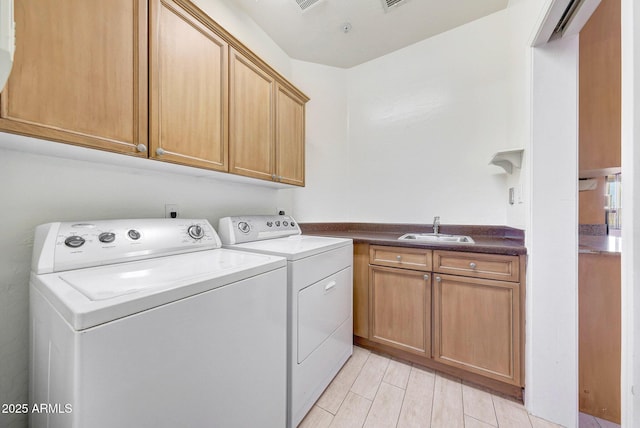 10253 E Indigo Dr, Scottsdale, AZ 85255 - laundry room featuring cabinet space and independent washer and dryer