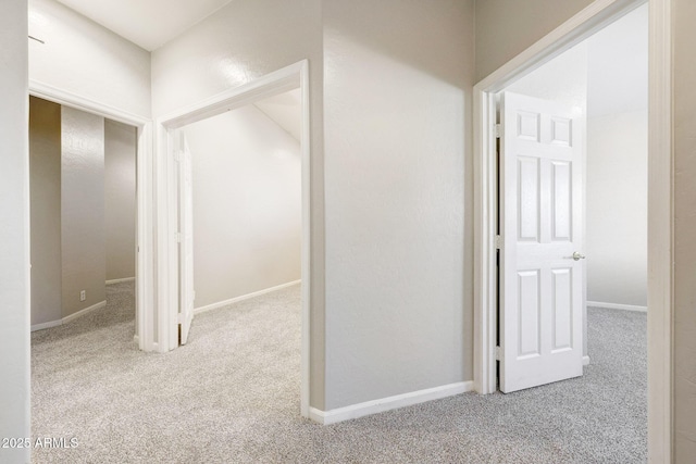 10253 E Indigo Dr, Scottsdale, AZ 85255 - hallway with carpet floors and baseboards