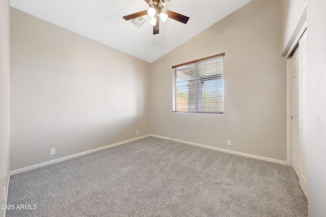 10253 E Indigo Dr, Scottsdale, AZ 85255 - unfurnished room with lofted ceiling, carpet flooring, ceiling fan, and baseboards