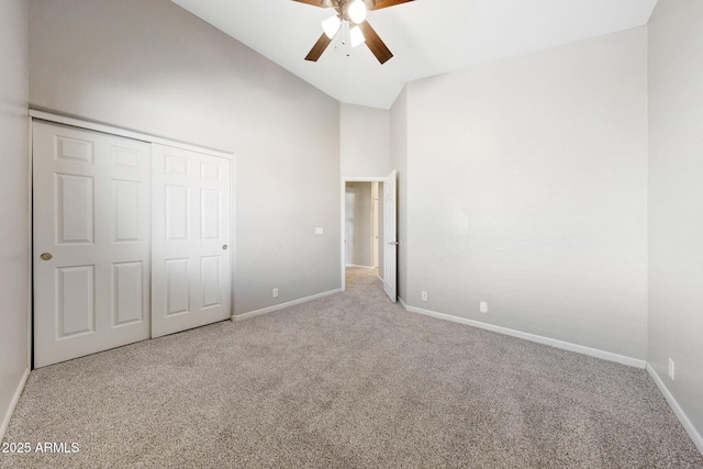 10253 E Indigo Dr, Scottsdale, AZ 85255 - unfurnished bedroom featuring carpet, baseboards, high vaulted ceiling, ceiling fan, and a closet