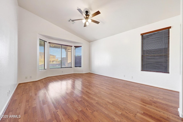 10253 E Indigo Dr, Scottsdale, AZ 85255 - unfurnished room with lofted ceiling, ceiling fan, light wood-type flooring, and baseboards