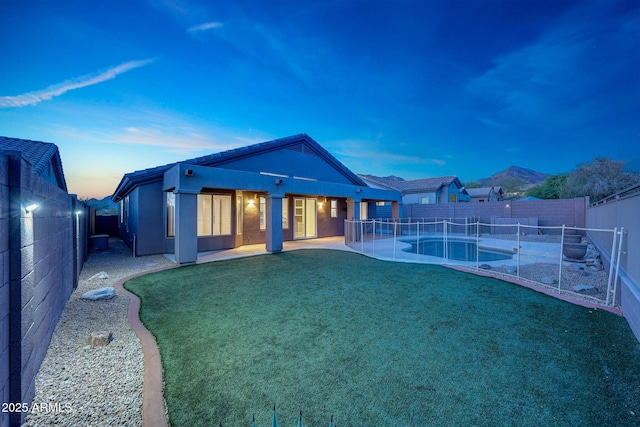10253 E Indigo Dr, Scottsdale, AZ 85255 - rear view of property with stucco siding and a patio area