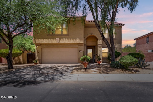 view of front of property featuring a garage